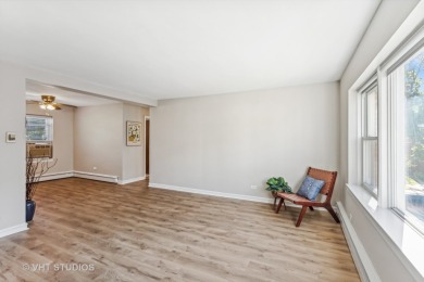 Welcome home to this desirable second floor corner unit drenched on Robert Black Golf Course in Illinois - for sale on GolfHomes.com, golf home, golf lot