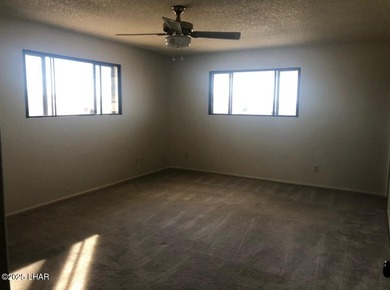 Tremendous opportunity in a terrific neighborhood! This unique on London Bridge Golf Course in Arizona - for sale on GolfHomes.com, golf home, golf lot