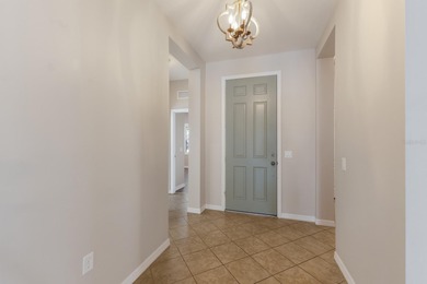 Welcome to a home that feels like vacation the moment you arrive on Esplanade Golf and Country at Lakewood Ranch in Florida - for sale on GolfHomes.com, golf home, golf lot