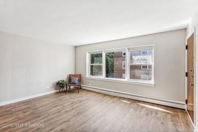 Welcome home to this desirable second floor corner unit drenched on Robert Black Golf Course in Illinois - for sale on GolfHomes.com, golf home, golf lot