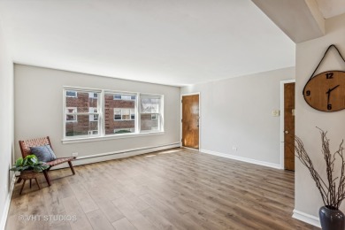 Welcome home to this desirable second floor corner unit drenched on Robert Black Golf Course in Illinois - for sale on GolfHomes.com, golf home, golf lot