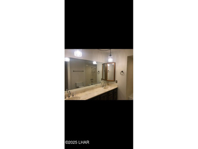 Tremendous opportunity in a terrific neighborhood! This unique on London Bridge Golf Course in Arizona - for sale on GolfHomes.com, golf home, golf lot