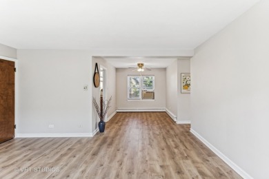 Welcome home to this desirable second floor corner unit drenched on Robert Black Golf Course in Illinois - for sale on GolfHomes.com, golf home, golf lot