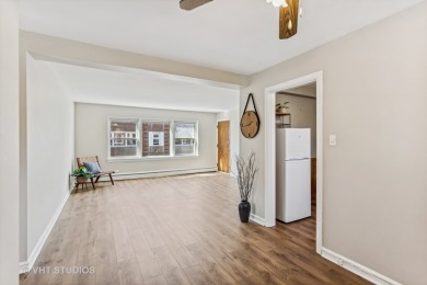 Welcome home to this desirable second floor corner unit drenched on Robert Black Golf Course in Illinois - for sale on GolfHomes.com, golf home, golf lot