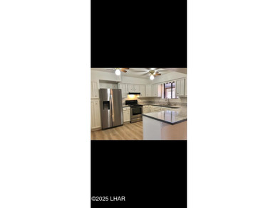 Tremendous opportunity in a terrific neighborhood! This unique on London Bridge Golf Course in Arizona - for sale on GolfHomes.com, golf home, golf lot