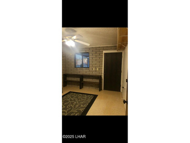 Tremendous opportunity in a terrific neighborhood! This unique on London Bridge Golf Course in Arizona - for sale on GolfHomes.com, golf home, golf lot