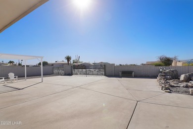 Tremendous opportunity in a terrific neighborhood! This unique on London Bridge Golf Course in Arizona - for sale on GolfHomes.com, golf home, golf lot