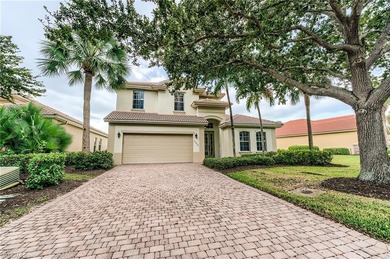 This stunning home features a spacious screened lanai with south on Shadow Wood Country Club in Florida - for sale on GolfHomes.com, golf home, golf lot