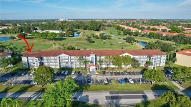 Breathtaking 2 bedroom, 2 bathroom corner unit with view on Flamingo Lakes Country Club in Florida - for sale on GolfHomes.com, golf home, golf lot