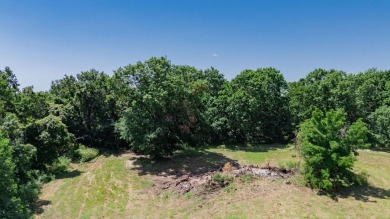 Roughly four and a half acres tucked just outside the Stockton on Stockton Country Club in Missouri - for sale on GolfHomes.com, golf home, golf lot