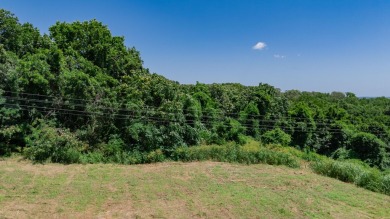 Roughly four and a half acres tucked just outside the Stockton on Stockton Country Club in Missouri - for sale on GolfHomes.com, golf home, golf lot