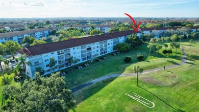 Breathtaking 2 bedroom, 2 bathroom corner unit with view on Flamingo Lakes Country Club in Florida - for sale on GolfHomes.com, golf home, golf lot
