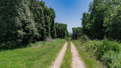 Roughly four and a half acres tucked just outside the Stockton on Stockton Country Club in Missouri - for sale on GolfHomes.com, golf home, golf lot