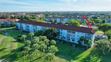 Breathtaking 2 bedroom, 2 bathroom corner unit with view on Flamingo Lakes Country Club in Florida - for sale on GolfHomes.com, golf home, golf lot