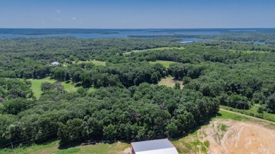Roughly four and a half acres tucked just outside the Stockton on Stockton Country Club in Missouri - for sale on GolfHomes.com, golf home, golf lot