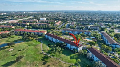 Breathtaking 2 bedroom, 2 bathroom corner unit with view on Flamingo Lakes Country Club in Florida - for sale on GolfHomes.com, golf home, golf lot