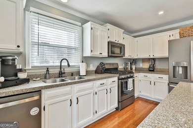 This home is move-in ready with all the major systems updated on Braelinn Golf Club in Georgia - for sale on GolfHomes.com, golf home, golf lot