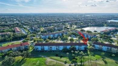 Breathtaking 2 bedroom, 2 bathroom corner unit with view on Flamingo Lakes Country Club in Florida - for sale on GolfHomes.com, golf home, golf lot