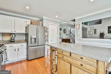 This home is move-in ready with all the major systems updated on Braelinn Golf Club in Georgia - for sale on GolfHomes.com, golf home, golf lot