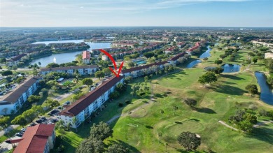 Breathtaking 2 bedroom, 2 bathroom corner unit with view on Flamingo Lakes Country Club in Florida - for sale on GolfHomes.com, golf home, golf lot