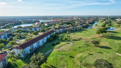 Breathtaking 2 bedroom, 2 bathroom corner unit with view on Flamingo Lakes Country Club in Florida - for sale on GolfHomes.com, golf home, golf lot