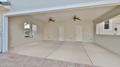 Location, location, location!  A 2007 custom built Hangar home on Spruce Creek Golf Club in Florida - for sale on GolfHomes.com, golf home, golf lot