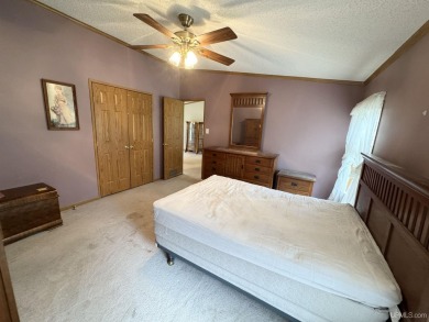Welcome to this well-maintained 3-bedroom, 2-bath manufactured on Crystal View Municipal Golf Course in Michigan - for sale on GolfHomes.com, golf home, golf lot