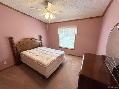 Welcome to this well-maintained 3-bedroom, 2-bath manufactured on Crystal View Municipal Golf Course in Michigan - for sale on GolfHomes.com, golf home, golf lot