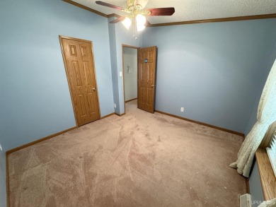 Welcome to this well-maintained 3-bedroom, 2-bath manufactured on Crystal View Municipal Golf Course in Michigan - for sale on GolfHomes.com, golf home, golf lot