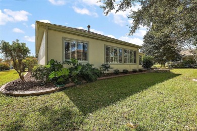 Welcome to This Elegant Hampton Model nestled in a cul-de-sac on on Eagle Ridge At Spruce Creek Country Club in Florida - for sale on GolfHomes.com, golf home, golf lot