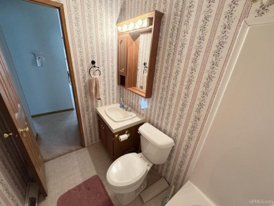Welcome to this well-maintained 3-bedroom, 2-bath manufactured on Crystal View Municipal Golf Course in Michigan - for sale on GolfHomes.com, golf home, golf lot
