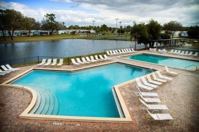 This beautifully maintained and fully upgraded home offers true on Schalamar Creek Golf and Country Club in Florida - for sale on GolfHomes.com, golf home, golf lot