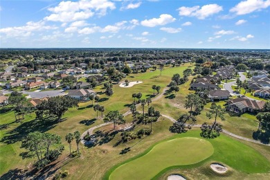 Welcome to This Elegant Hampton Model nestled in a cul-de-sac on on Eagle Ridge At Spruce Creek Country Club in Florida - for sale on GolfHomes.com, golf home, golf lot