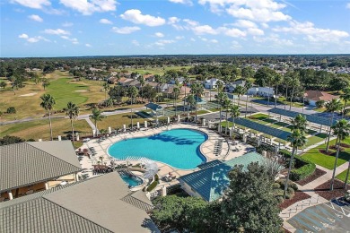 Welcome to This Elegant Hampton Model nestled in a cul-de-sac on on Eagle Ridge At Spruce Creek Country Club in Florida - for sale on GolfHomes.com, golf home, golf lot