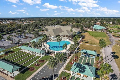 Welcome to This Elegant Hampton Model nestled in a cul-de-sac on on Eagle Ridge At Spruce Creek Country Club in Florida - for sale on GolfHomes.com, golf home, golf lot