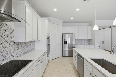 Beautifully updated with a fresh new look and feel, this chic on The Plantation Golf and Country Club in Florida - for sale on GolfHomes.com, golf home, golf lot