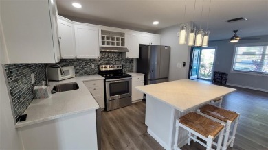 Welcome to this unique home in the 55+ neighborhood of on Mainlands Golf Club in Florida - for sale on GolfHomes.com, golf home, golf lot