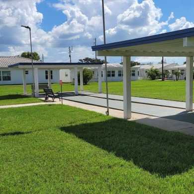 Welcome to this unique home in the 55+ neighborhood of on Mainlands Golf Club in Florida - for sale on GolfHomes.com, golf home, golf lot