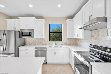 CORNER LOT - DESIGNER SELECTIONS-  IMPACT GLASS-  4' GARAGE on Panther Run Golf Club in Florida - for sale on GolfHomes.com, golf home, golf lot