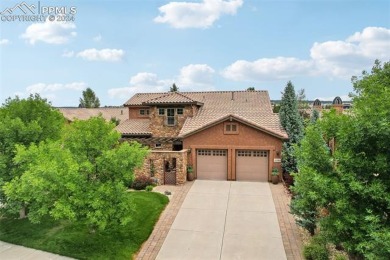 Experience unparalleled luxury and tranquility backing to a on The Club At Flying Horse in Colorado - for sale on GolfHomes.com, golf home, golf lot