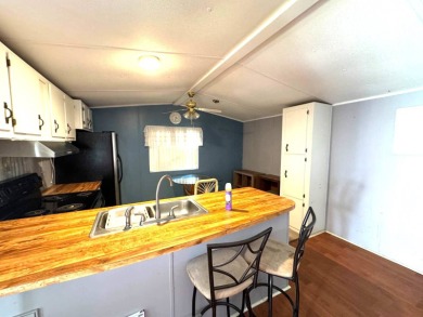 You don't want to miss this great deal on a 2-bedroom/1-bath on Lake Henry Golf Club in Florida - for sale on GolfHomes.com, golf home, golf lot