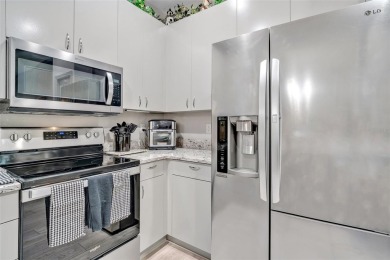 BEAUTIFUL, 3BD/2BA, END UNIT VILLA in The Links at Pelican on Pelican Pointe Golf and Country Club in Florida - for sale on GolfHomes.com, golf home, golf lot