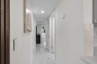 Prepare to be impressed--this 1st-floor 2 bed, 2 bath Kings on Kings Point Golf -Flanders Way in Florida - for sale on GolfHomes.com, golf home, golf lot
