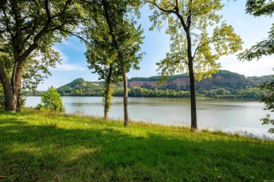 Welcome to Round River!  This one-level, 2-bedroom / 2 bathroom on Rebsamen Park Golf Course in Arkansas - for sale on GolfHomes.com, golf home, golf lot