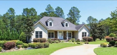 Very Private, beautiful home with 3 car garage and circular on Dublin Country Club in Georgia - for sale on GolfHomes.com, golf home, golf lot