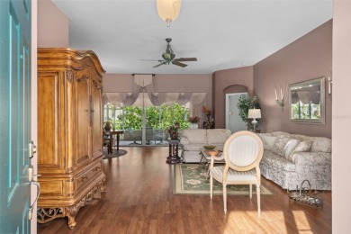 This end-unit Sea Breeze Villa nestled within Pine Meadow on Heritage Pines Country Club in Florida - for sale on GolfHomes.com, golf home, golf lot