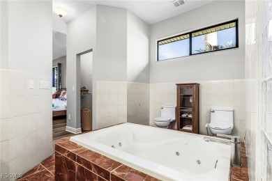 Welcome to this one-of-a-kind, spacious 4-bedroom, 2-large-den on Royal Tee Country Club in Florida - for sale on GolfHomes.com, golf home, golf lot