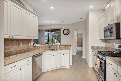 Welcome to a life that feels like vacation every day. Nestled in on Arlington Ridge Golf Club in Florida - for sale on GolfHomes.com, golf home, golf lot