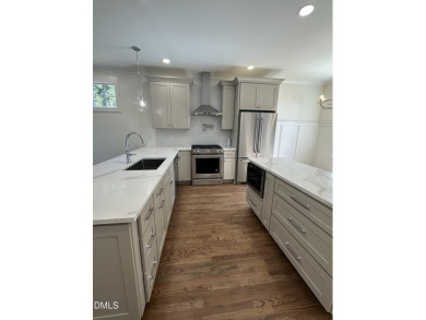 This beautifully appointed modern home at 2538 W Wilson St on Hillandale Golf Course in North Carolina - for sale on GolfHomes.com, golf home, golf lot