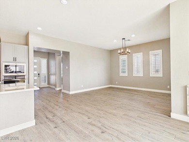 Welcome to refined living in Ovation at Mountain Falls. This on Mountain Falls Golf Course in Nevada - for sale on GolfHomes.com, golf home, golf lot